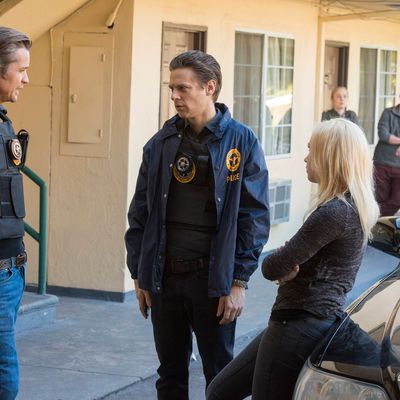 JUSTIFIED -- Raw Deal -- Episode 507 (Airs Tuesday, February 25, 10:00 pm e/p) -- Pictured: (L-R) Timothy Olyphant as Deputy U.S. Marshal Raylan Givens, Jacob Pitts as Deputy Marshal Tim Gutterson, Adrienne Frantz as Candace -- CR: Prashant Gupta/FX