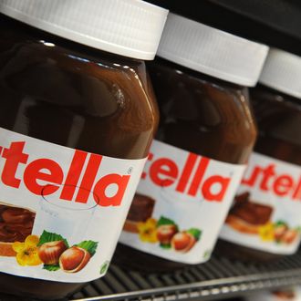 epa03006735 Nutella peanut butter jars are pictured on a shelf at a supermarket in Hamburg, Germany, 17 November 2011. Reports in Germany state the Nutella label contains misleading information on vitamins and nutritional values. The Higher Regional Court in Frankfurt am Main has now instructed manufacturer . EPA/MARCUS BRANDT