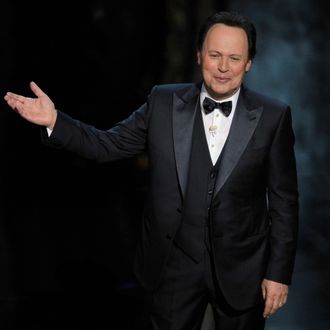 Host Billy Crystal performs onstage during the 84th Annual Academy Awards