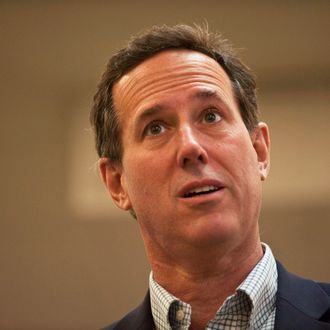 Republican presidential candidate, former U.S. Sen. Rick Santorum, speaks to supporters at Harvest Graphics