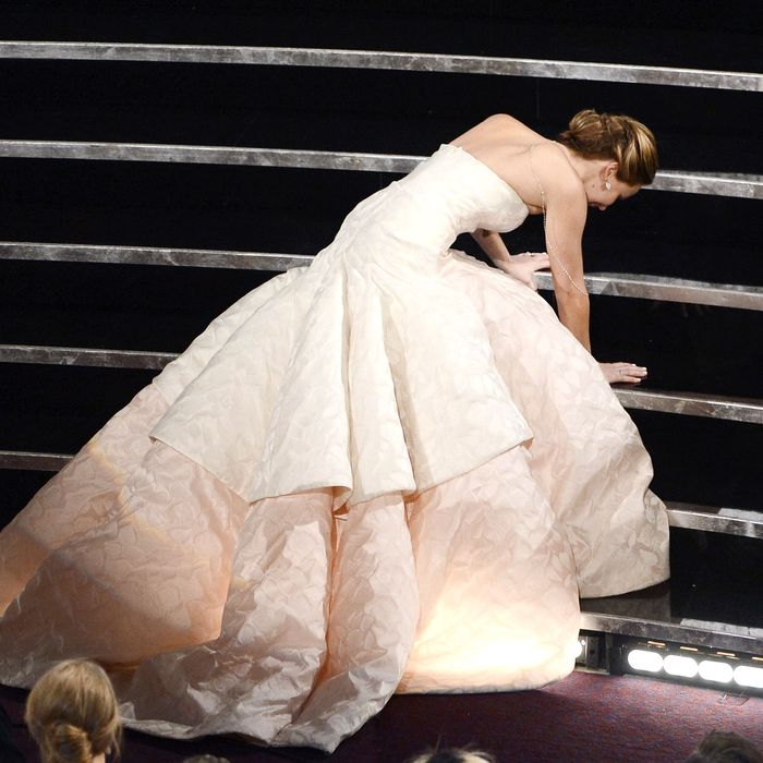 Actress Jennifer Lawrence reacts after winning the Best Actress award for 