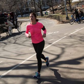 A woman goes for a jog in Central Park on March 11, 2014 in New York City. After an unusually frigid winter, temperatures are supposed to reach into the 60s today. 