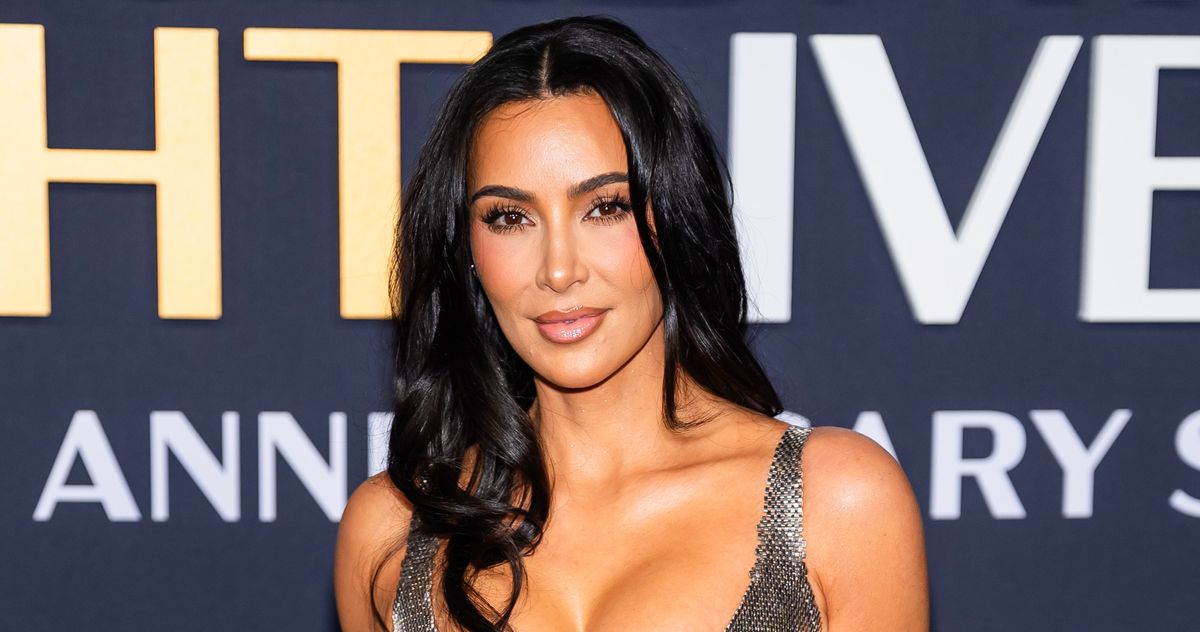 Kim Kardashian Modeled Her Face Wrap Wearing a Fur Coat
