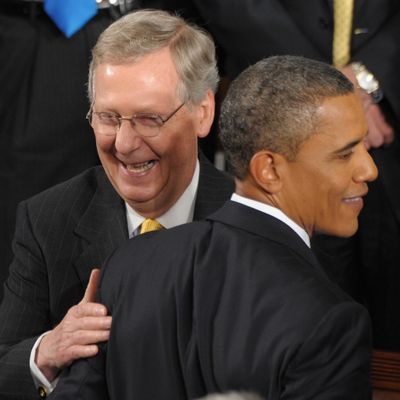 Senate Minority Leader Mitch McConnell greets US President Barack Obama following Obama's address to a Joint Session of Congress about the US economy and job creation at the US Capitol in Washington, DC, September 8, 2011.