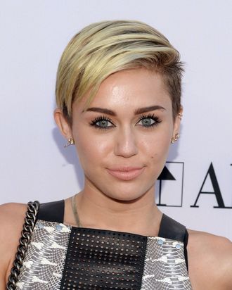 Miley Cyrus Desperately Trying to Grow Out Hair