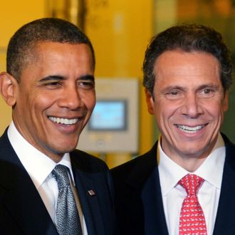 US President Barack Obama smiles with New York Governor Andrew Cuomo (R) during a tour of the of Nanoscale Science and Engineering?s (CNSE) Albany NanoTech Complex at the State University of New York May 8, 2012 in Albany, NY.