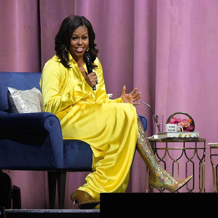 michelle obama wearing thigh high boots