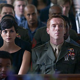 Morena Baccarin as Jessica Brody and Damien Lewis as Nicholas 