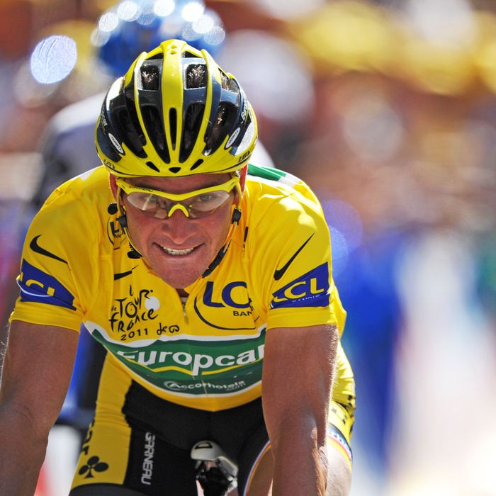 Yellow jersey of overall leader, France's Thomas Voeckler, ends riding on the finish line their 179 km and seventeenth stage of the 2011 Tour de France cycling race run between Gap and Pinerolo (Italy) on July 20, 2011. AFP PHOTO / PASCAL PAVANI (Photo credit should read PASCAL PAVANI/AFP/Getty Images)