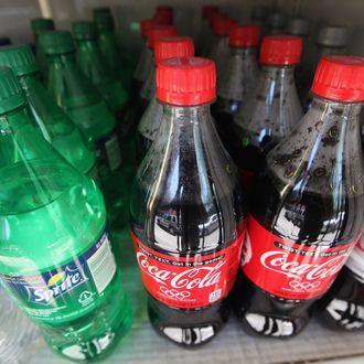 NEW YORK, NY - MAY 31: Twenty-ounce bottles of regular and diet soda are seen for sale at a Manhattan deli on May 31, 2012 in New York City. New York City Mayor Michael Bloomberg is proposing a ban on sodas and sugary drinks that are more than 16 ounces in an effort to combat obesity. Diet sodas would not be covered by the ban. (Photo by Mario Tama/Getty Images)