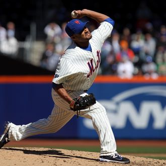 Johan Santana #57 of the New York Mets throws a pitch against the Atlanta Braves during their Opening Day Game at Citi Field on April 5, 2012 in New York City. 