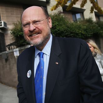 Republican candidate for New York City mayor Joe Lhota departs a polling station after casting his vote on November 5, 2013 in the Brooklyn borough of New York City. 