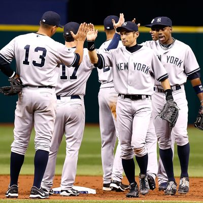 Outfielder Ichiro Suzuki #31 of the New York Yankees celebrates his team's victory over the Tampa Bay Rays at Tropicana Field on September 5, 2012 in St. Petersburg, Florida.