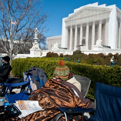 Paul Mazzuca rests in front of the Supreme Court in Washington on March 22, 2013 as people begin lining up for the court's upcoming coming hearings on gay marriage. The justices will hear arguments Tuesday on California's Proposition 8 ban on same-sex marriage and on Wednesday on the federal Defense of Marriage Act, which defines marriage as between one man and one woman. 