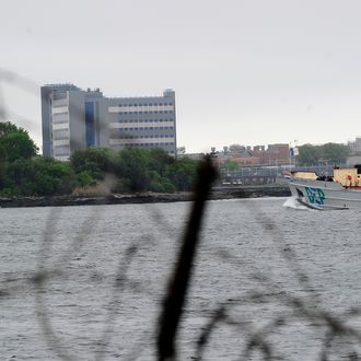 A view of buildings at the Rikers Island penitentiary complex where IMF head Dominique Strauss-Kahn is being held in New York on May 17, 2011. The grand jury deciding whether or not to send IMF chief Dominique Strauss-Kahn to trial has until May 20th to decide. In the meantime, Strauss-Kahn, accused of attempting to rape a hotel maid, remains incarcerated without bail because a judge deemed him liable to attempt escape to France, which does not extradite citizens to the United States. AFP PHOTO/Emmanuel Dunand (Photo credit should read EMMANUEL DUNAND/AFP/Getty Images)