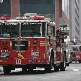 New York City Fire Department engines that responded to reports of a fire at the One World Trade Center tower drive down a street on August 8, 2012 in New York, that turned out to be a false alarm. Dozens of New York firefighters rushed to the World Trade Center skyscraper early Wednesday after a member of the public mistook welding for a fire. Initial reports from the New York Fire Department suggested a minor blaze on the 88th floor of One World Trade Center, the centerpiece in the project to replace the Twin Towers destroyed in the September 11, 2001 terrorist attacks. A spokesman told AFP the fire was brought under control in less than an hour.