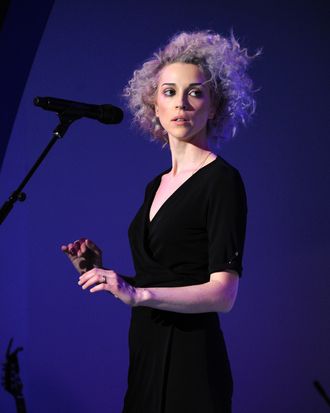 Singer/musician St. Vincent performs at the American Express UNSTAGED Fashion with DVF at Spring Studios on February 9, 2014 in New York City. 