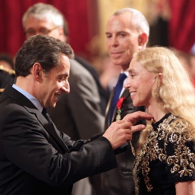 Nicolas Sarkozy awards Franca Sozzani the Legion of Honor.