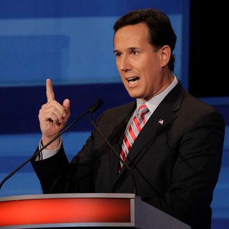 Republican presidential candidate, former Pennsylvania Sen. Rick Santorum, participates in a presidential debate in Sioux City, Iowa, Thursday, December 15, 2011. AFP PHOTO / Pool / Eric Gay (Photo credit should read ERIC GAY/AFP/Getty Images)