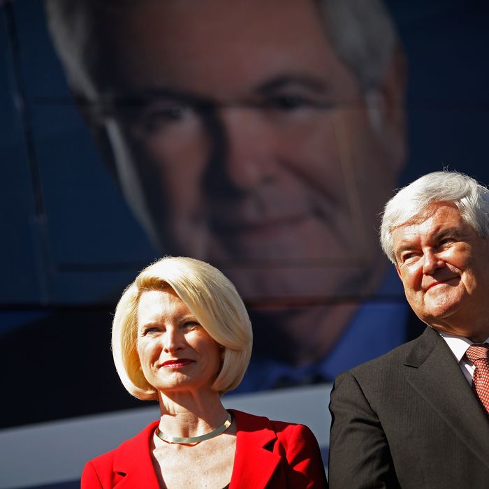 SUMTER COUNTY, FL - JANUARY 29: Republican presidential candidate and former Speaker of the House Newt Gingrich (R-GA) (R) and his wife Callista Gingrich hold a campaign rally at The Villages, master-planned age-restricted retirement community, January 29, 2012 in Sumter County, Florida. Gingrich picked up the endorsement of former GOP presidential candidate Herman Cain Saturday night, three days before the January 31 GOP primary. Gingrich predicted Saturday, 
