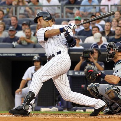 NEW YORK, NY - JULY 07: Derek Jeter #2 of the New York Yankees hits a double in the first inning for career hit 2998 while playing against the Tampa Bay Rays at Yankee Stadium on July 7, 2011 in the Bronx borough of New York City. (Photo by Michael Heiman/Getty Images)