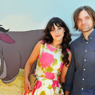 Actress/singer Zooey Deschanel and musician Ben Gibbard arrive at Walt Disney Pictures presents the premiere of 