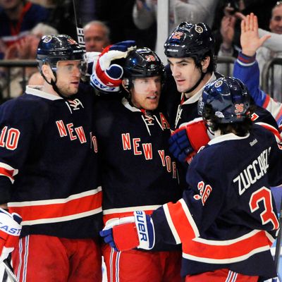 New York Rangers Marian Gaborik (10), Brad Richards (19), Brian Boyle (22) and Mats Zuccarello (36) celebrate Richard's goal against New York Islanders