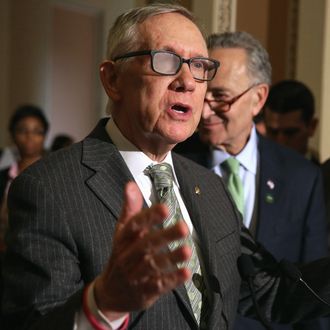 Senate Minority Leader Harry Reid (D-NV) talks to reporters following the Senate Democratic policy luncheon at the U.S. Captiol March 17.
