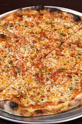 It's the 'Medicine Wheel.' This is Vermont Flatbread's "traditional" entry level pizza, made with house-made organic tomato sauce, whole milk mozzarella, Blythdale Farm Cooksville Grana, Gran Padano, and fresh herbs.