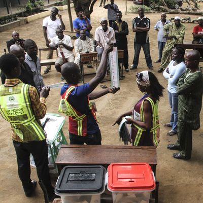 Electoral officials in Lagos count ballots in Nigeria's 2015 presidential election.