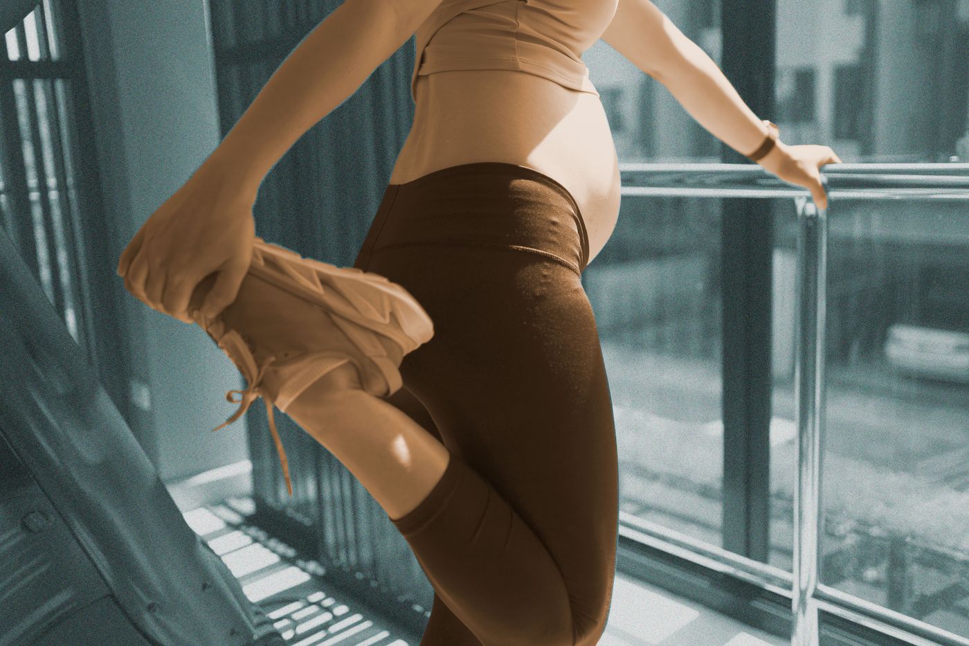 Asian Young wearing maternity wear Pregnant Woman Exercise and stretching workout and copyspace