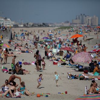 The crowds tend to gather near 92nd St. at Rockaway Beach like this day on Sunday, June 20, 2011.