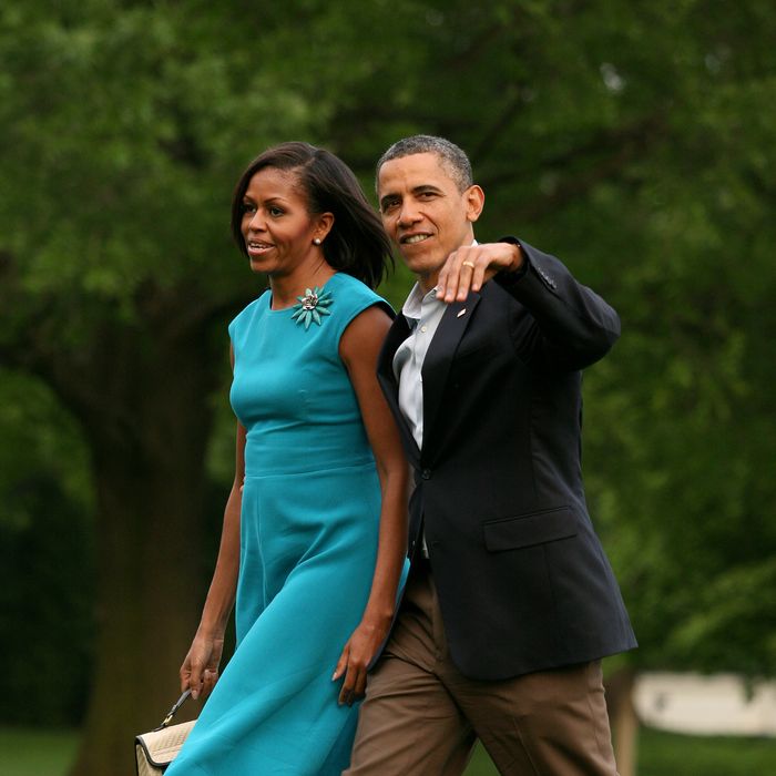 U.S. President Barack Obama and first lady Michelle Obama return to the South Lawn of the White House following a day trip to Ohio and Virginia on May 5, 2012 in Washington, DC. President Obama officially kicked off his 2012 campaign for reelection today. 