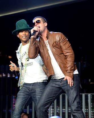 FAYETTEVILLE, AR - JUNE 06: Pharrell Williams and Robin Thicke perform during the Walmart 2014 annual shareholdersmeeting on June 6, 2014 at Bud Walton Arena at the University of Arkansas in Fayetteville, Arkansas. (Photo by Jamie McCarthy/Getty Images for Walmart)