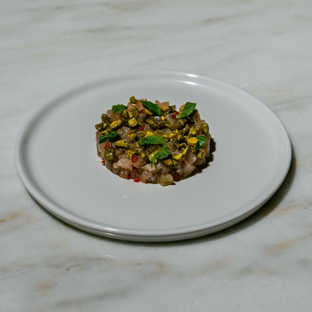 Swordfish tartare with toasted pistachios, pickled fresnos, and mint.