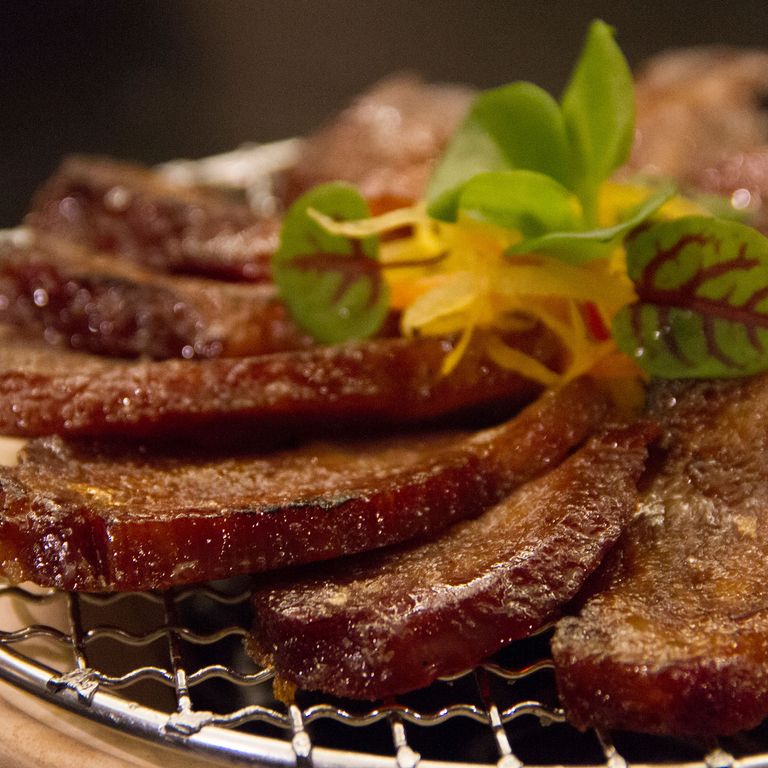 Berkshire-pork collar glazed with honey from the hotel’s rooftop apiary.