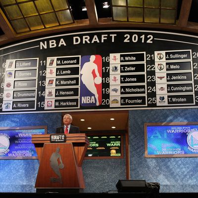 NBA Commissioner David Stern announces the number thirty overall pick by the Golden State Warriors during the first round of the 2012 NBA Draft at Prudential Center