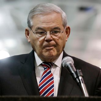U.S. Sen. Robert Menendez, D-NJ, pauses as he answers a questions while addressing a gathering, Monday, March 23, 2015, in Garwood, N.J. Menendez listened to questions about the possible filing of corruption charges against him. (AP Photo/Mel Evans)