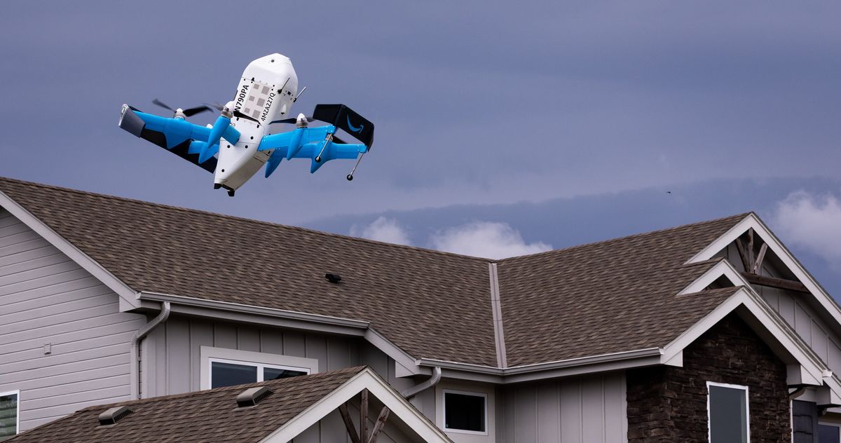 I Can't Stop Watching This Amazon Delivery Drone Drop Someone's Package in Their Pool