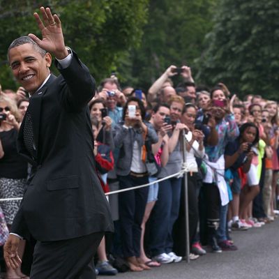 WASHINGTON, DC - MAY 02: U.S. President Barack Obama waves as he arrives at the White House May 2, 2012 in Washington, DC. Obama was returning from an unannounced trip to Afghanistan on the one year anniversary of the raid on the compound of Osama bin Laden. (Photo by Win McNamee/Getty Images)