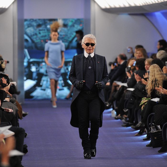 Karl Lagerfeld acknowledges the applause of the audience after the Chanel Haute-Couture Spring / Summer 2012 Show as part of Paris Fashion Week at Grand Palais on January 24, 2012 in Paris, France.