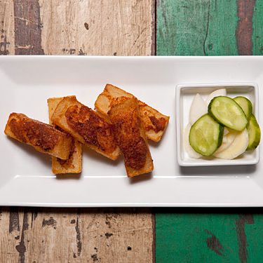 Thick-cut fries, house-made brandade, greenmarket pickles ($9)