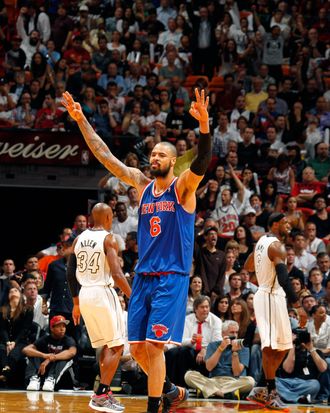 Tyson Chandler #6 of the New York Knicks puts his hand up after a three point shot agains the Miami Heat during a game on December 6, 2012 at American Airlines Arena in Miami, Florida. 