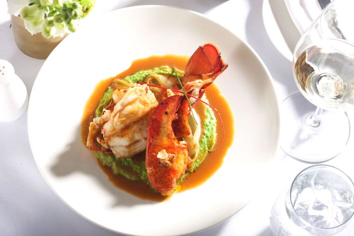 Butter-poached Maine lobster with sweet-pea mousseline, citrus-braised endiv​e, ​white-wine lobster sauce.