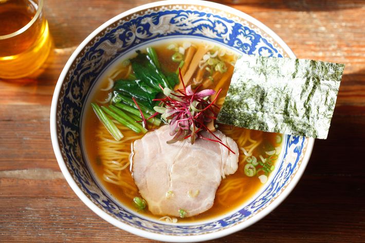 The torigara ramen is made with chashu, menma (pickled bamboo shoots), and spinach.