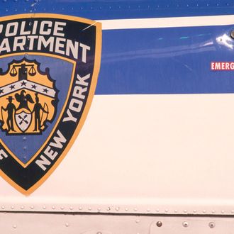 A New York Police Department emblem reading 