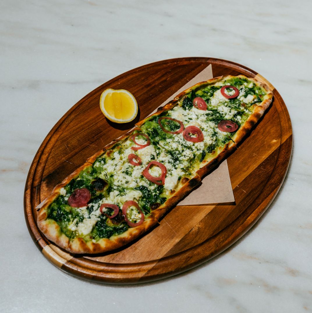Turkish flatbread with organic spinach.