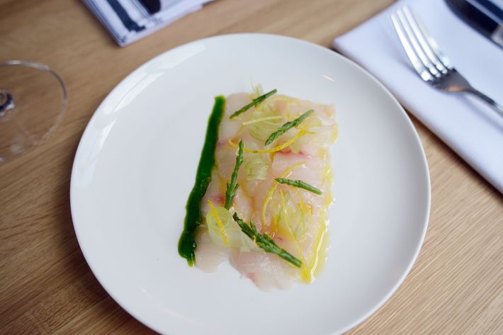 Striped bass crudo with sea beans and spring onion.