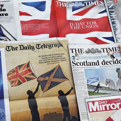 In this photo illustration, a selection of the British National Newspaper front pages are displayed on September 18, 2014 in London, England. After many months of campaigning the people of Scotland today head to the polls to decide the fate of their country. The referendum is too close to call but a Yes vote would see the break-up of the United Kingdom and Scotland would stand as an independent country for the first time since the formation of the Union. 