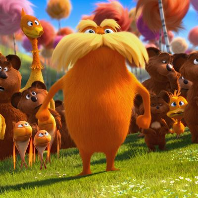 The Lorax (DANNY DEVITO) stands with the Bar-ba-loots, Swomee-Swans and Humming-Fish in 